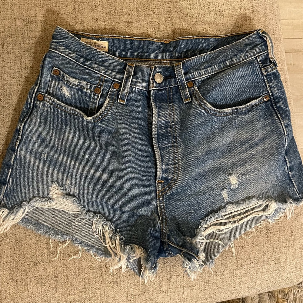 Levi’s 501 high waisted distressed denim shorts